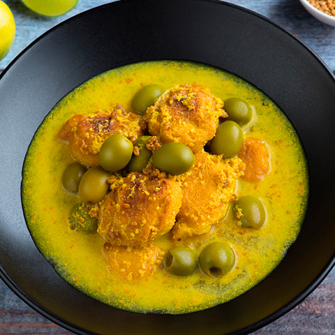 OLIVE TENGA (ASSAMESE SOUR CURRY) WITH LENTIL DUMPLINGS
